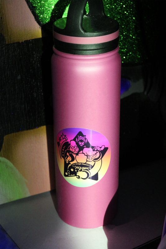 Sticker on pink bottled water in dark background