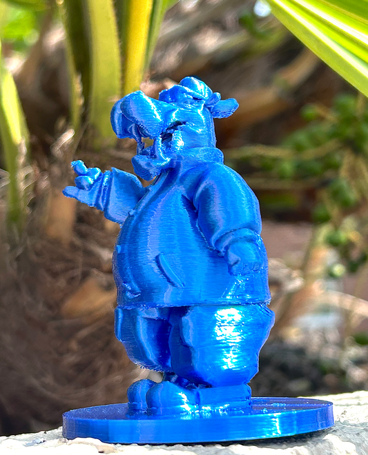 Blue McHippo 3D modeled figurine in forest background