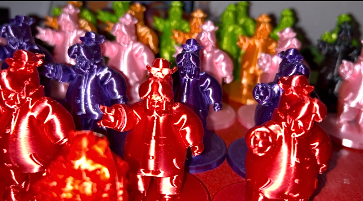 Colorful plastic McHippo figurines in a line