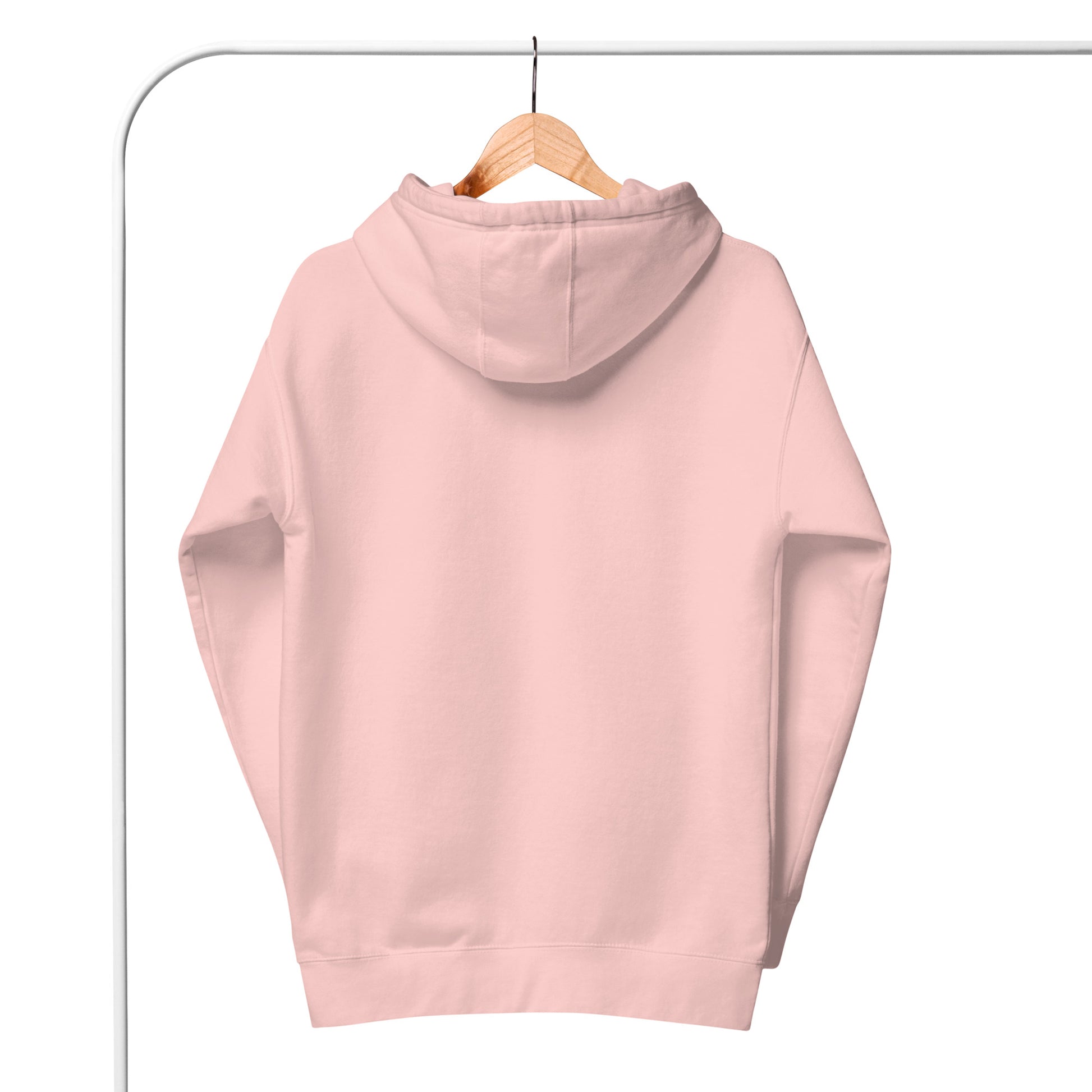 Pink hoodie on a hanger against a white background