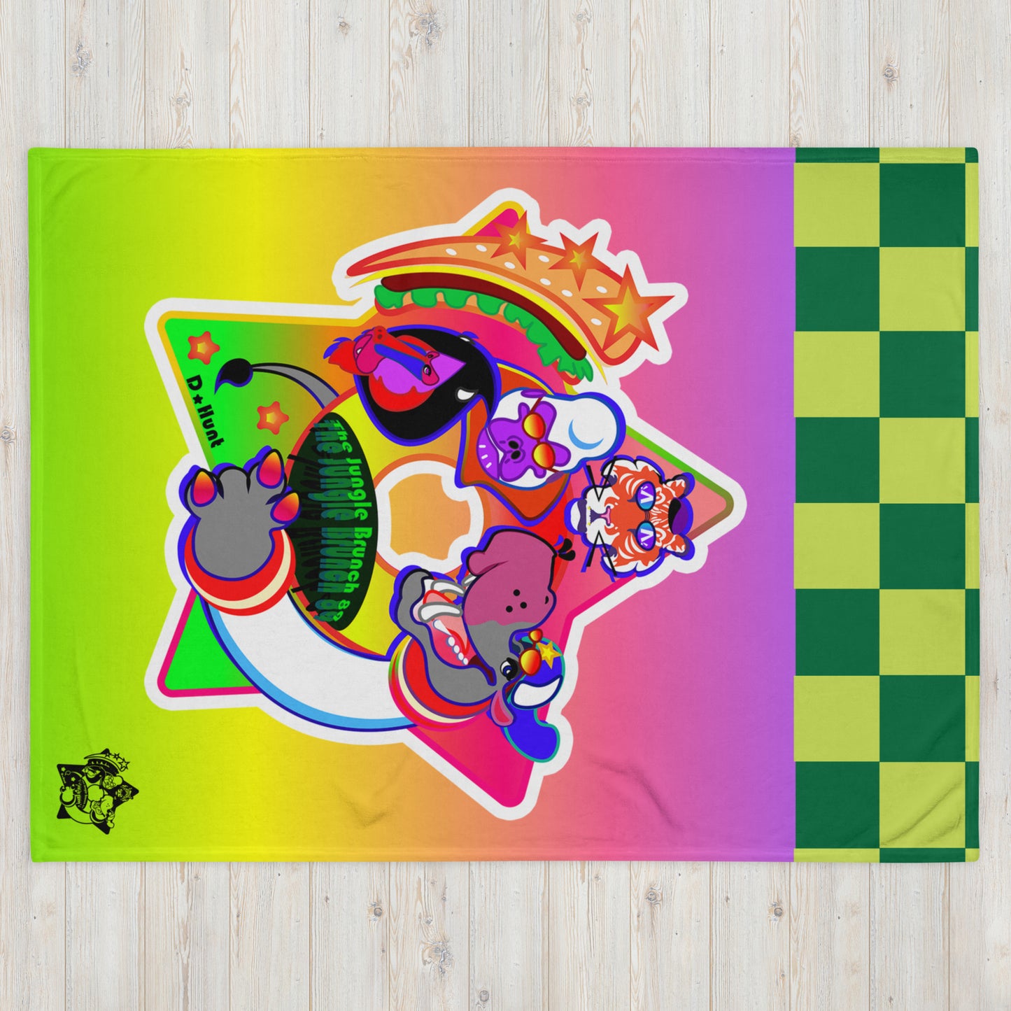Colorful rainbow blanket with checkered tiles and cartoon character logo on a wooden surface