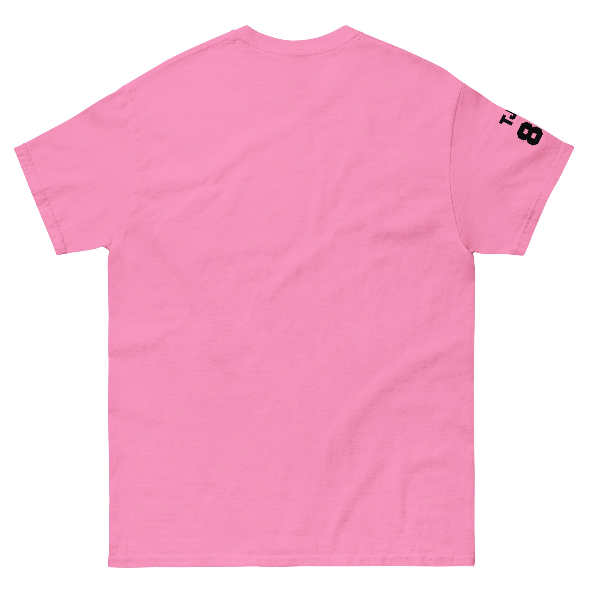 Pink t-shirt with a small black logo on the sleeve against a white background