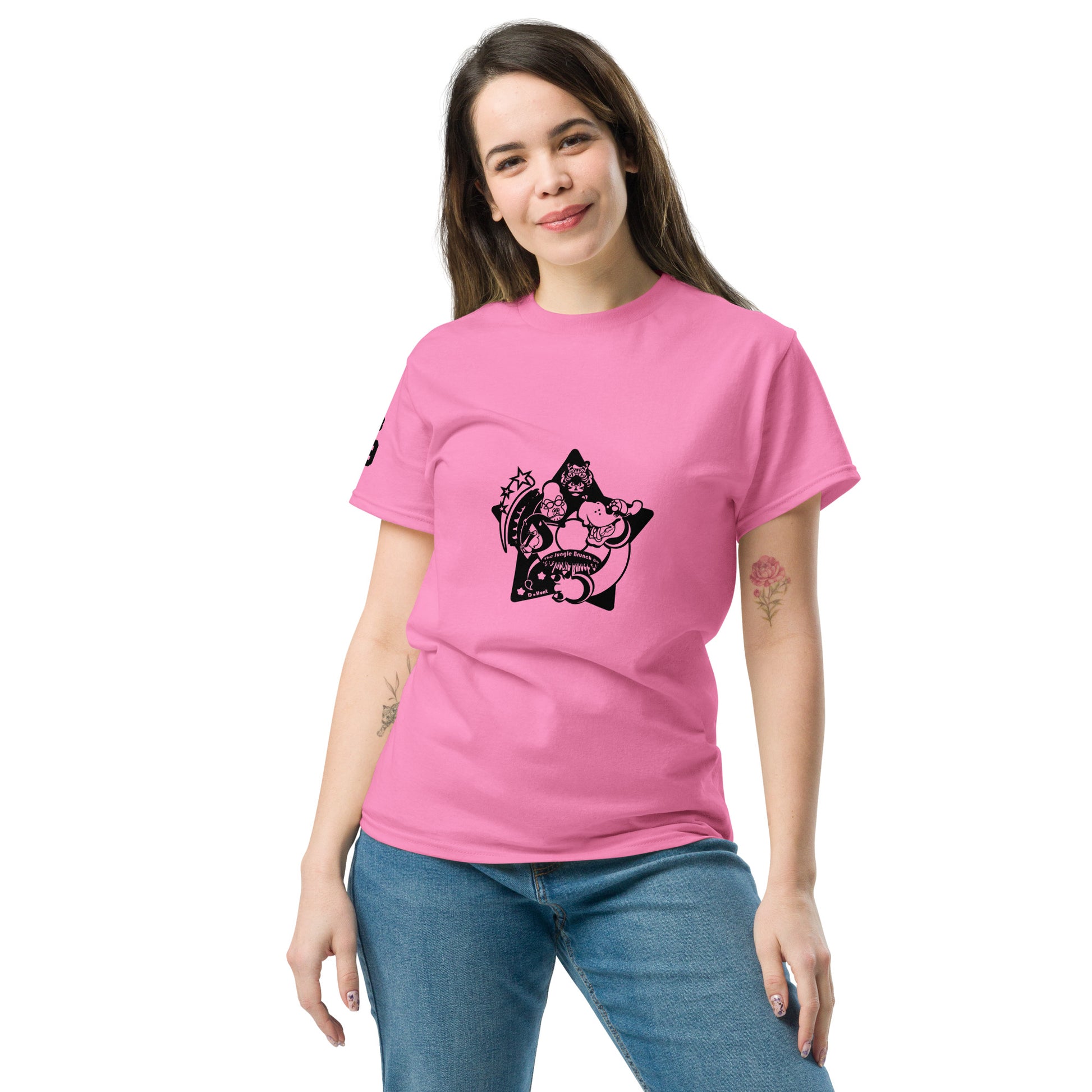 Woman wearing a pink t-shirt with a black graphic design on a white background