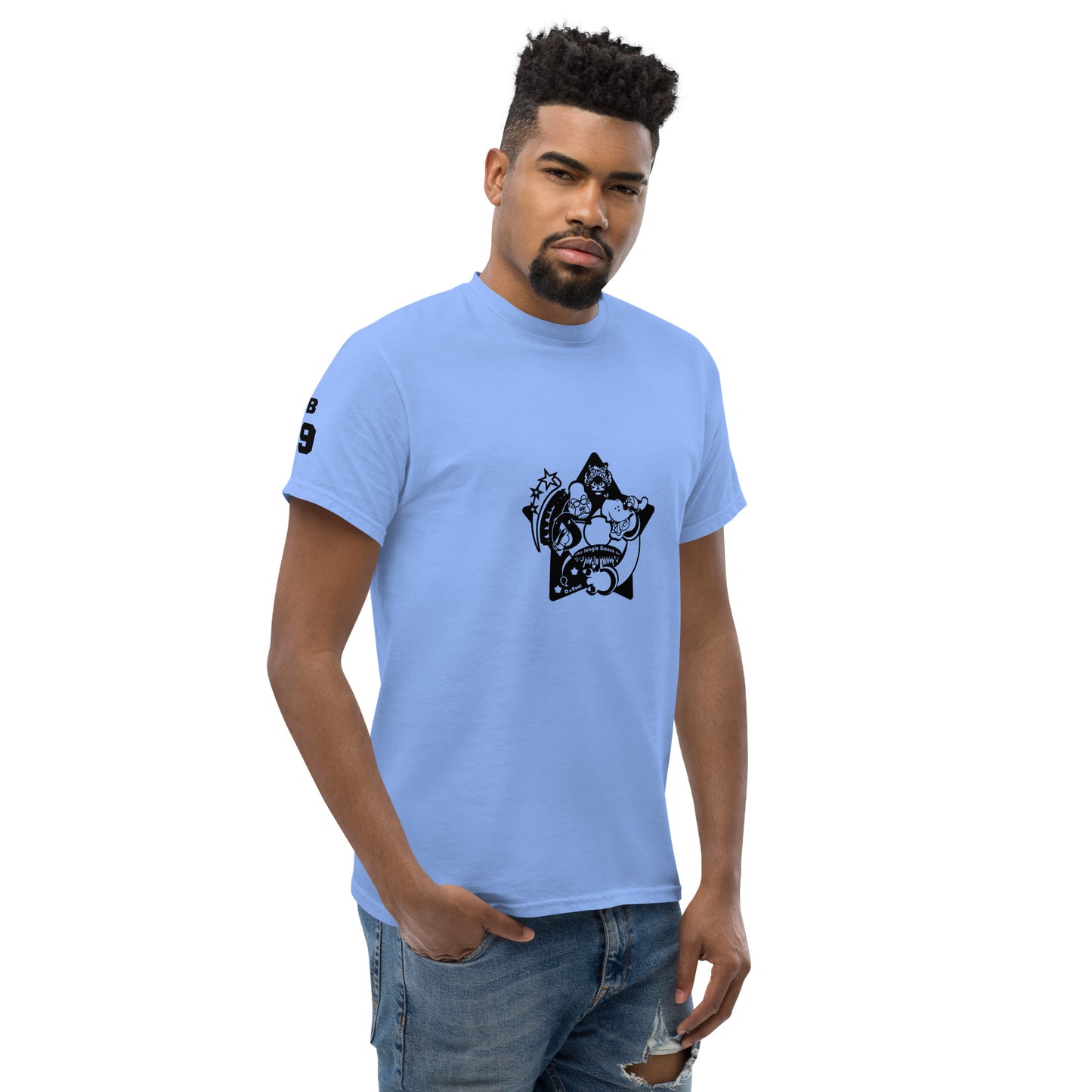 Man wearing a light blue t-shirt with a black graphic design on a white background
