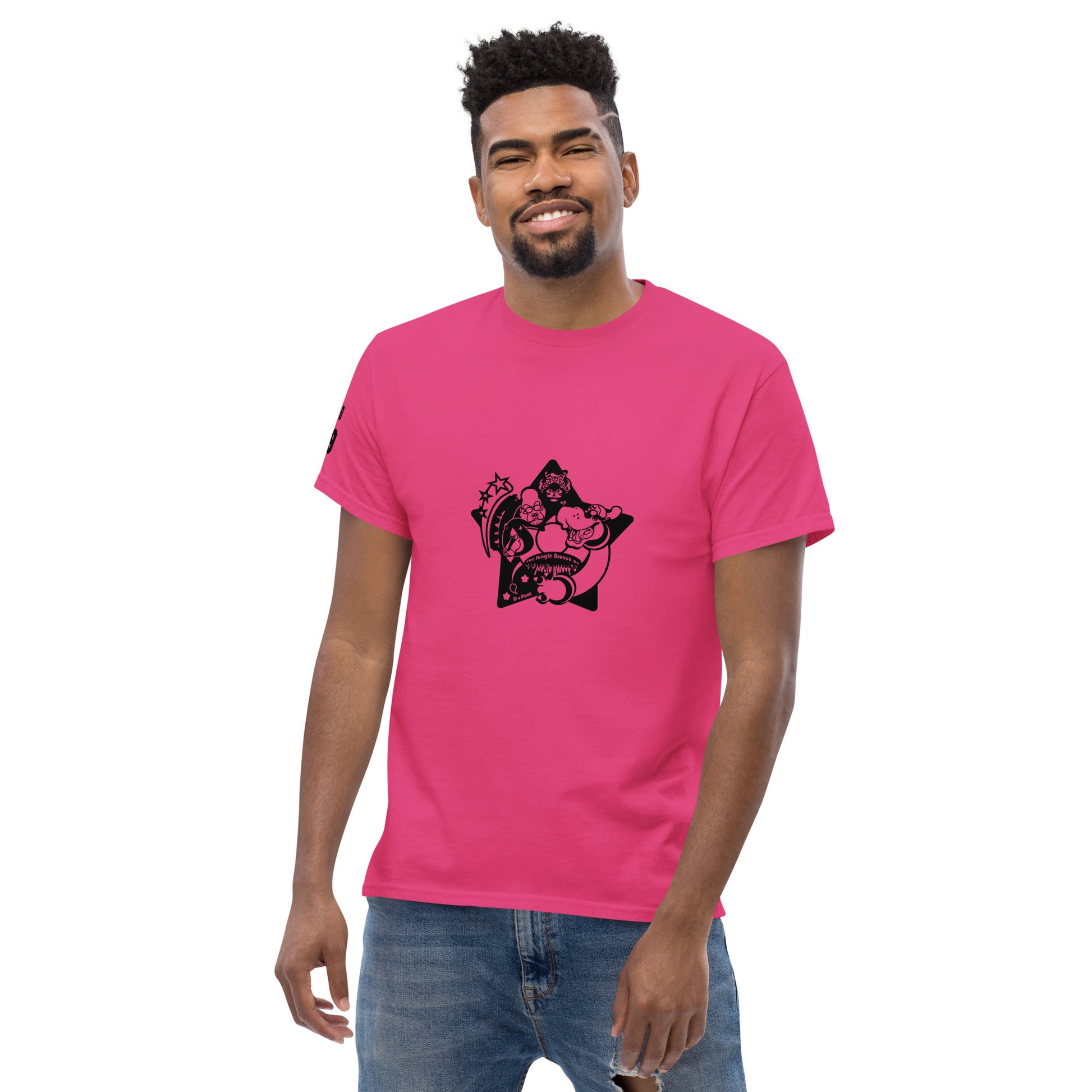 Man wearing a pink t-shirt with a black graphic design on a white background