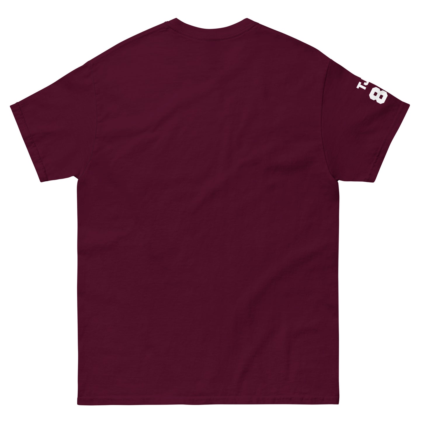 Maroon t-shirt with a small white logo on the sleeve against a white background