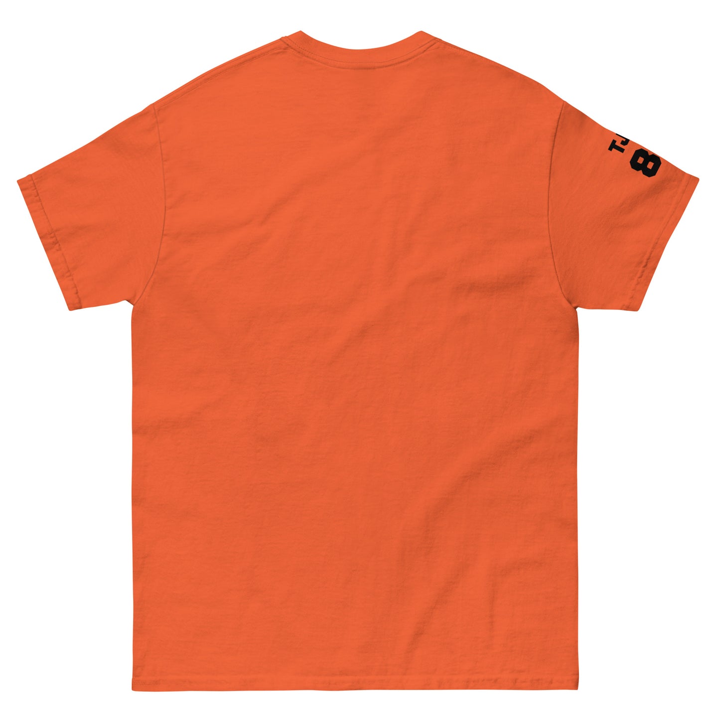 Orange t-shirt with a logo on the sleeve against a white background