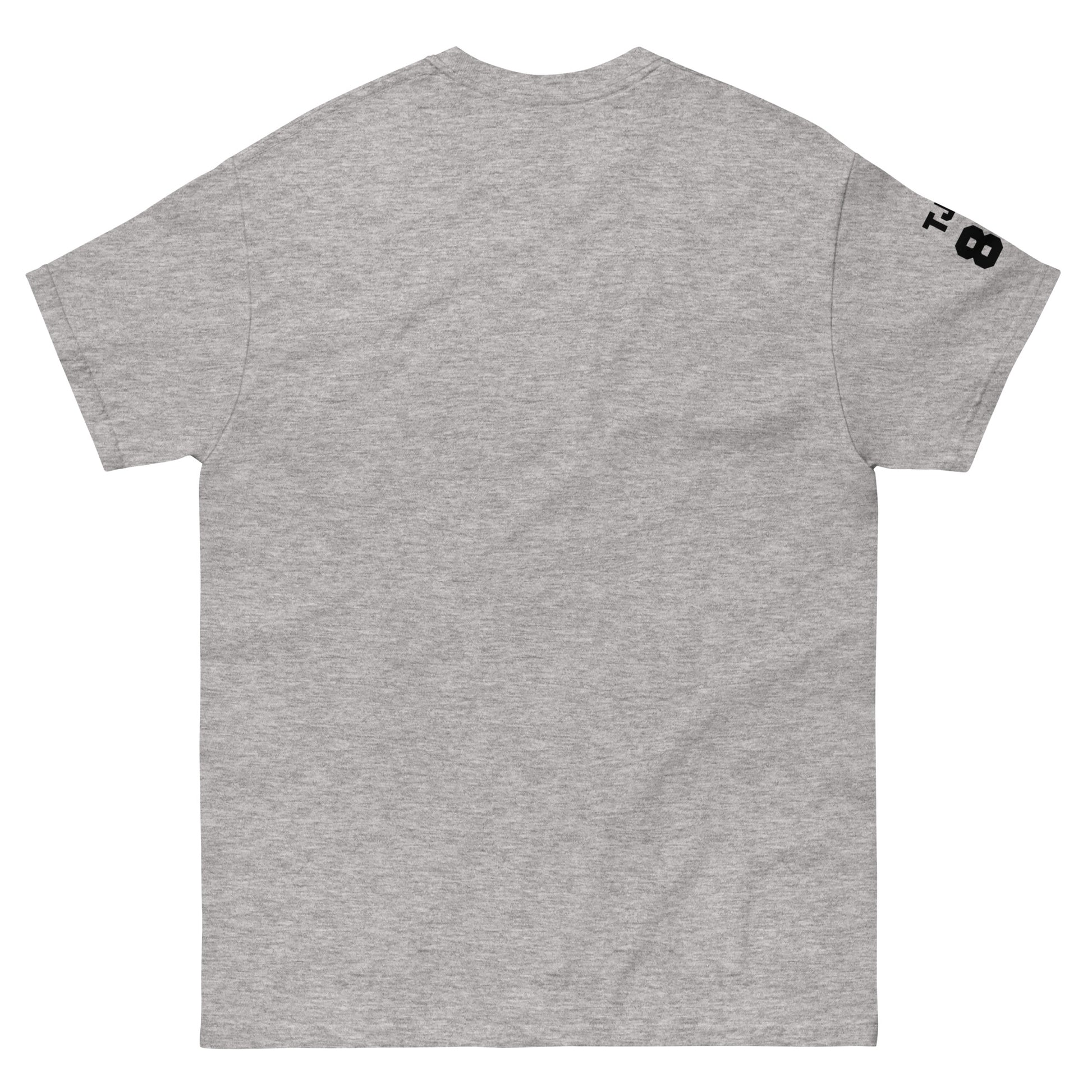 Gray t-shirt with a logo on the sleeve against a white background